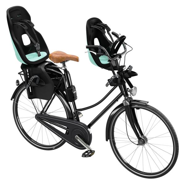 Thule Yepp Nexxt 2 Maxi kinderzitje achter voor framebevestiging op fiets, geschikt voor jonge kinderen.