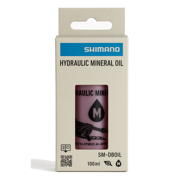 Shimano Minerale schijfremolie fles met rode dop voor optimale remprestaties en onderhoud van schijfremmen.