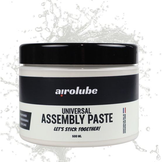 Airolube universele keramische montagepasta in een open container, biologisch afbreekbaar en geschikt voor diverse montagewerkzaamheden