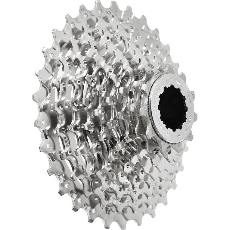 Shimano Cs-Hg400-9 9-speed cassette met metalen tandwielen en stevige constructie, geschikt voor mountainbike en racefietsen.