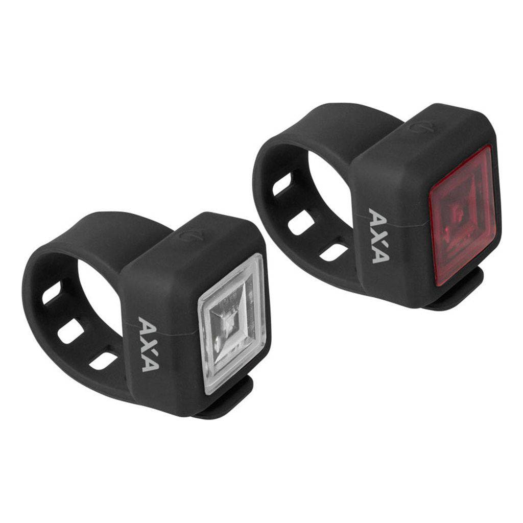 Zwarte Axa Niteline 11 LED verlichtingset met lampen, geschikt voor fietsen, op een witte achtergrond.