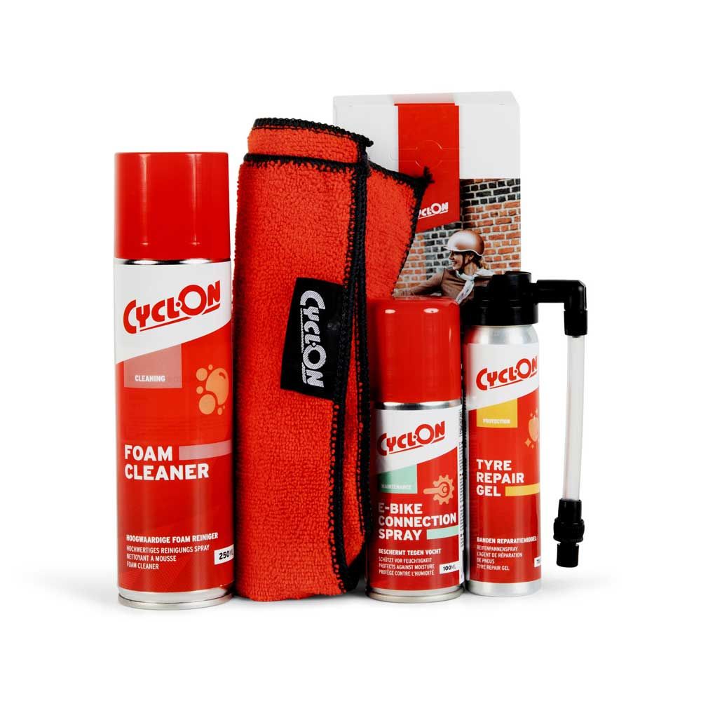 CyclOn E-bike servicepakket met reiniging en bandenreparatie, inclusief gereedschap en onderdelen voor onderhoud.
