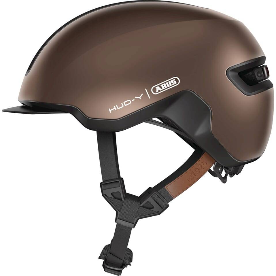 Abus E-Bike helm Hud-Y met ventilatiegaten en verstelbare riem, ontworpen voor veilig fietsen op een e-bike.