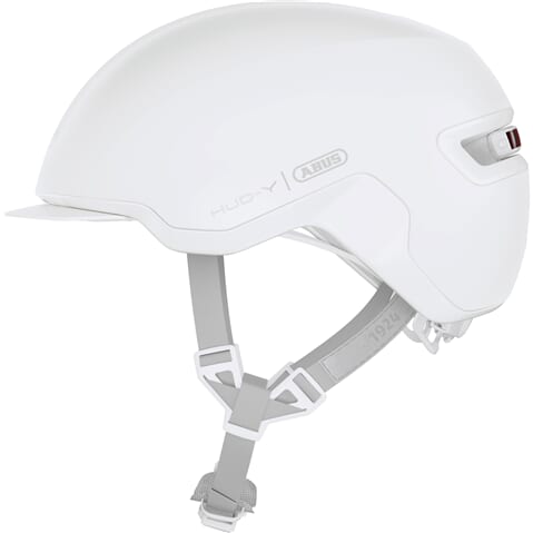 Abus Hud-Y kinderfietshelm met magnetische USB-achter-LED en comfortabele pasvorm, geschikt voor jonge fietsers.
