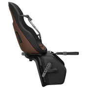 Fietsachterzitje Thule Yepp Nexxt 2 Maxi bevestigd op een fiets met drager, geschikt voor veilige kinderopvang.
