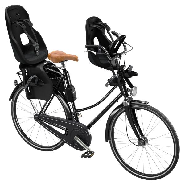 Thule Yepp Nexxt 2 Maxi kinderzitje achter voor framebevestiging op een fiets, zwart en stevig ontworpen voor kinderen.