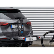 Zwarte XLC Azura 2.0 CC-X08 fietsframebevestiging met lange sleutel, gedetailleerde close-up van de montage.