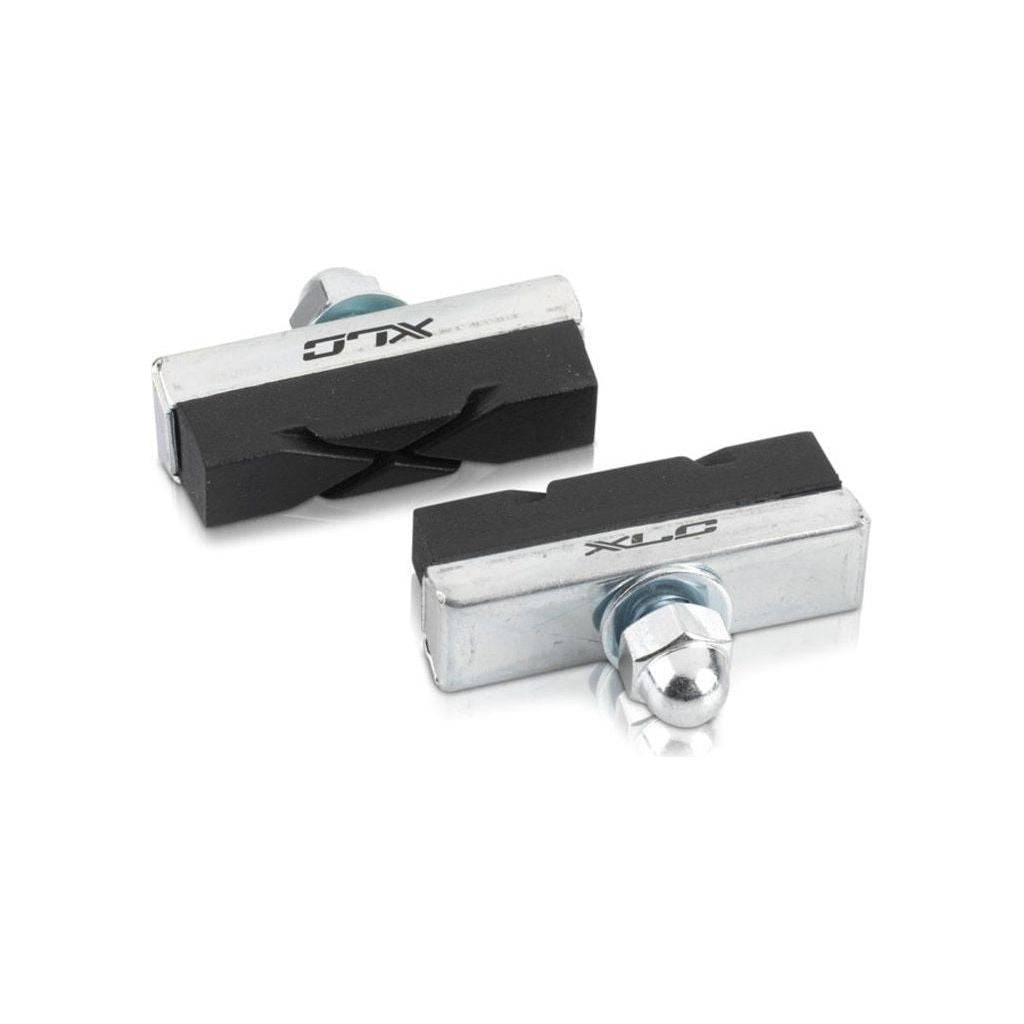 Set van vier zwarte remschoenen voor caliper XLC Bs-C04, 40 mm, geschikt voor fietsremmen, zichtbaar in de afbeelding.