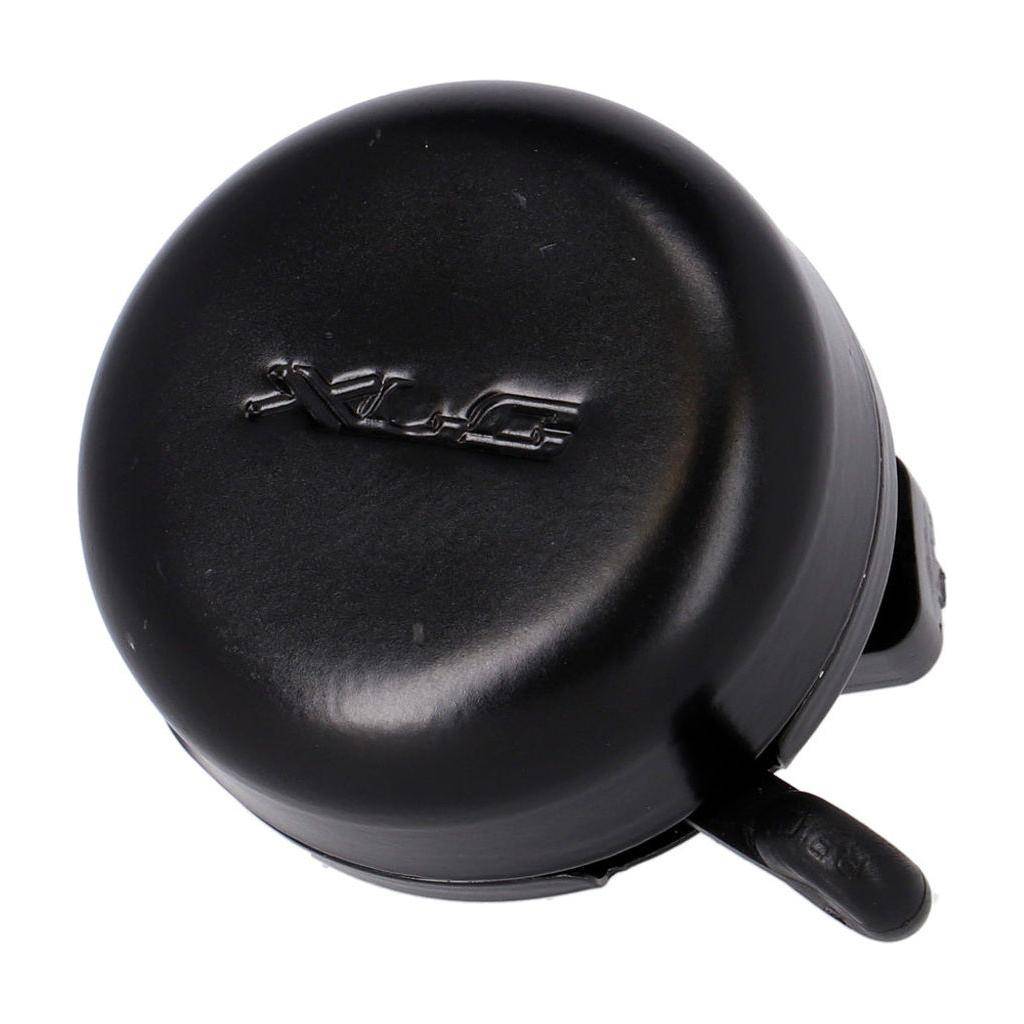 Zwarte XLC fietbel Whistle DD-M34 van 55 mm met draagclip en glanzende afwerking, geschikt voor fietsaccessoires.