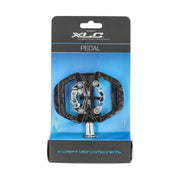 Zwarte XLC ATB Combi PD-S14 MTB pedalen met 9/16" SPD, zichtbaar in close-up op een stel.