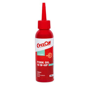 Fietsvoorvork olie CyclOn Fork Oil 10 W-Hp in een heldere fles, geschikt voor het smeren van fietsvering en vorken.