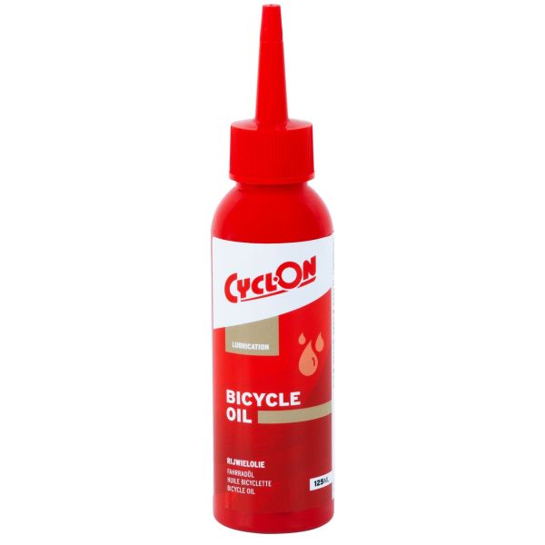 Fietsolie van CyclOn, waterafstotende smeermiddel voor fietsen, 100 ml, toont de fles met olie en label.