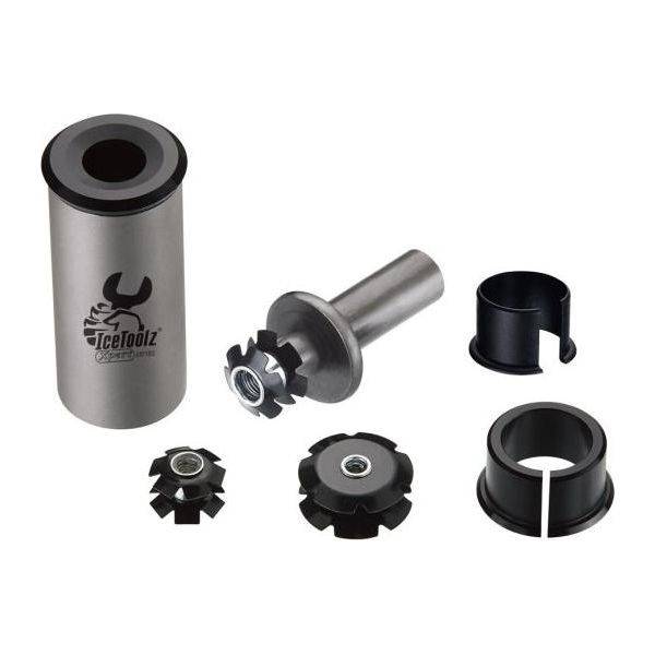 Inslagmoer Icetoolz Xpert E114 voor balhoofdgereedschap, zwart metalen onderdeel met cilindrische vorm en scherpe randen.