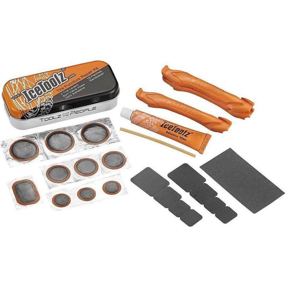 Reparatieset Icetoolz 24065A1 in blikje voor bandreparaties, inclusief gereedschap en reparatiemateriaal voor banden.