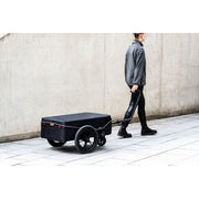 Zwarte XLC Cargo BS-C11 fietskar met 16 inch wielen, inklapbaar en geschikt voor transport van bagage of goederen.