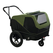 Zwarte en groene inklapbare hondenfietskar van XLC met 16-inch wielen, ideaal voor het vervoer van honden.
