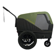 Zwarte en groene XLC hondenfietskar met inklapbare frame en 16-inch wielen, geschikt voor kleine honden.