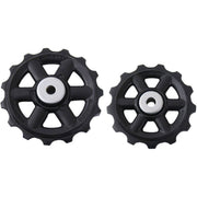Shimano RD-M310/CT95 derailleurwieltje set met 13T en 15T wielletjes voor 8-speed fietsen, zichtbaar met metalen schijven.