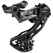 Shimano GRX RD-RX810 achterderailleur voor 11-speed met directe bevestiging en Shadow RD+ technologie, zichtbaar op de foto.
