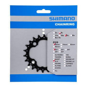 Zwart Shimano Deore FC-M617 aluminium kettingblad voor 10-speed mountainbike, zichtbaar met tandwielen en bevestigingspunten