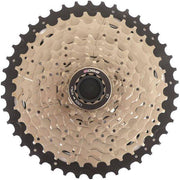 Edge Cs-M6010 10-speed cassette met nikkelplating en zwarte fosfatering, zichtbaar op de afbeelding.