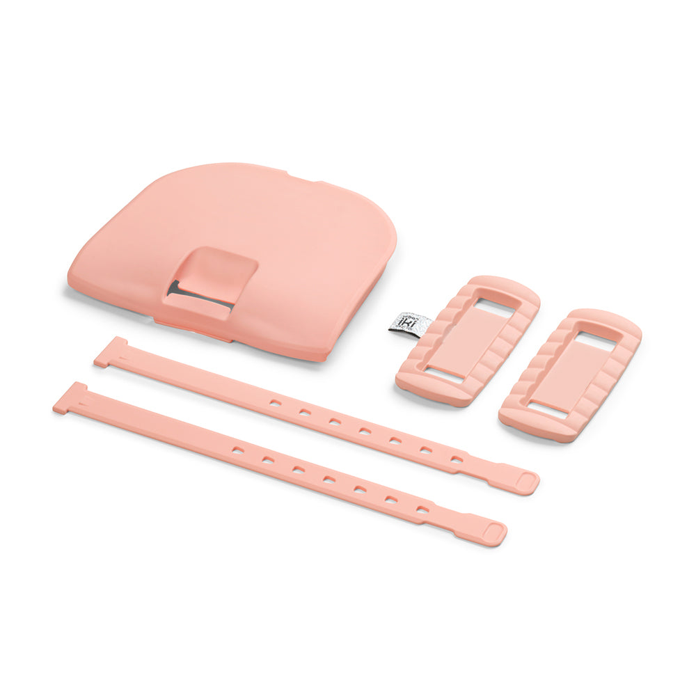 Urban Iki Sango Peach zitje accessoires voor fietsstoeltjes, kleurrijk en comfortabel voor jonge kinderen.