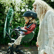 Urban Iki Ta-ke BIO fietsstoeltje voor kinderfiets met verstelbare zitting en veiligheidsriemen, geschikt voor jonge kinderen.