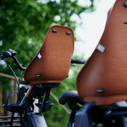 Urban Iki Ta-ke BIO fietsstoeltje voor kinderfiets met verstelbare zitting en veilige bevestiging, geschikt voor jonge kinderen.