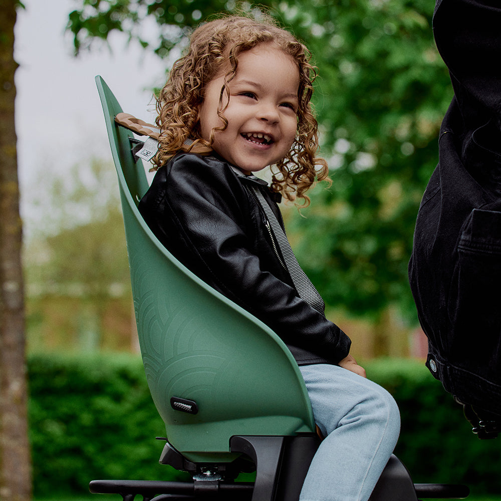 Urban Iki achterfietszitje met Ta-ke dragerbevestiging voor veilige kinderzitjes op de fiets.