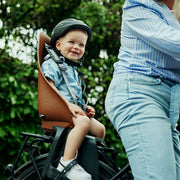 Urban Iki achterzitje Ta-ke BIO fietsstoeltje met dragerbevestiging, geschikt voor veilige kinderverzorging op de fiets.