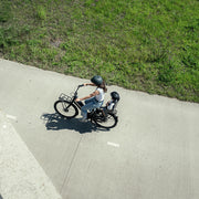 Urban Iki achterzitje U-me MIK HD voor fiets achterop, zwart met verstelbare bevestiging en veiligheidsbeugel.