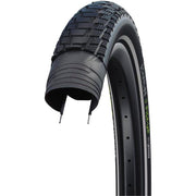 Zwarte Schwalbe Pick-Up Perf Sd Twinskin 27.5 stadsfiets buitenband met reflectie, zichtbaar op de fiets.