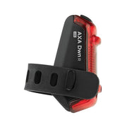 Zwart Axa Dwn USB-C oplaadbaar achterlicht met 1 lux verlichting, zichtbaar op de fiets.