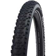 Schwalbe 29-inch Smart Sam Plus MTB buitenband met ADDIX GreenGuard, reflectie en zwarte kleur op een fiets.