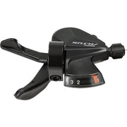 Zwarte Shimano Altus SL-M2010 3-speed shifters voor links, geschikt voor mountainbikes en snelheidsregeling.