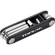 Topeak Essentials fietsonderdeel kit met compacte Topeak minipomp en accessoires voor fietsreparaties.