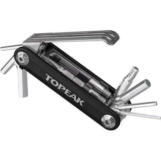 Topeak Ninja Master+ gereedschapskist T11 met blauwe deksel en diverse gereedschappen voor fietsreparaties, zichtbaar in de afbeelding.