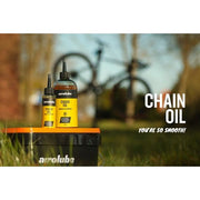 Airolube Chainoil kettingolie biologisch afbreekbaar smeermiddel voor fietsen en motoren, zichtbaar op de afbeelding