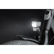 Axa NXT koplamp voor e-bike, 6-12V, met geïntegreerde reflector, zwart kunststof, zichtbaar in de afbeelding