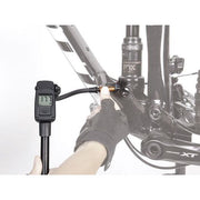Topeak Minipomp Pocket Shock Digital, compacte fietspomp met digitale drukmeter voor schokdempers.