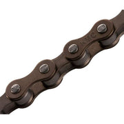 Bruine KMC S1 Wide ketting voor single speed fiets, 112 schakels, 1/2" x 1/8" breed, zichtbaar op de afbeelding