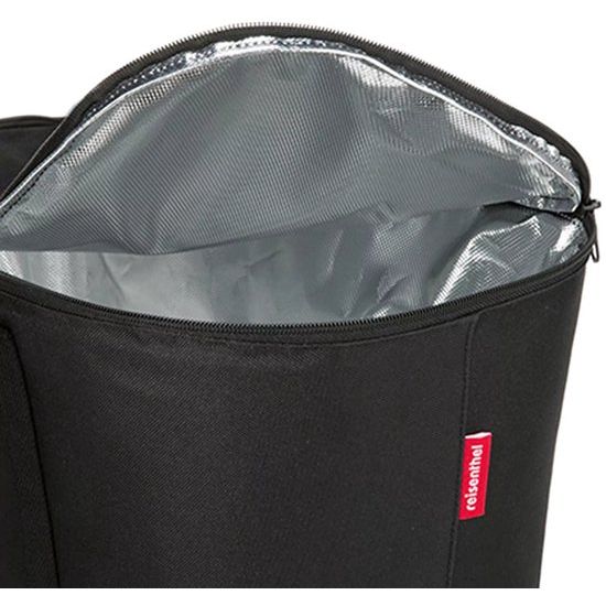 KLICKfix tasaccessoires in zwart, close-up van de stevige bevestigingsclip en verstelbaar bandmateriaal.