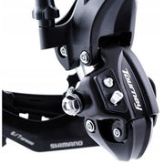 Shimano Tourney TY300 achterderailleur voor 6/7-speed fietsen, zwart met haak, zichtbaar in de afbeelding.