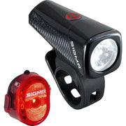 Sigma Buster 150 en Nugget II USB verlichtingsset met lampen en accessoires voor fotografie, op een witte achtergrond.
