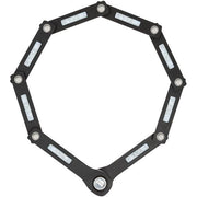 Zwart Axa Fold Lite 80 Duo vouwslot voor extra fietsbeveiliging, zichtbaar in de afbeelding.