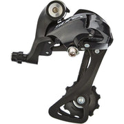Shimano RD-R3000 Sora 9-speed achterderailleur in zwart, zichtbaar vanaf de top met normale montage op een fiets.