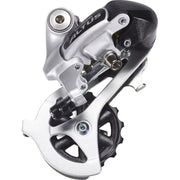 Shimano Altus RD-M310 achterderailleur voor 7/8-speed fietsen, zilverkleurig met wide-link design.