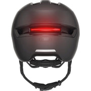 Abus Hud-Y Ace speed pedelec helm met geïntegreerd vizier en USB-achterlicht, gemaakt van stevig materiaal voor fietsen.