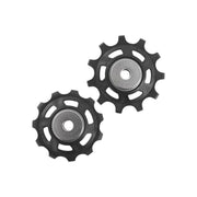 Shimano XTR RD-M9000 derailleurwieltjes voor fiets, close-up van de hoogwaardige derailleurwieltjes in zwart en metalen onderdelen