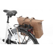 Nieuwe Looxs Verla 21 liter leren fietstas voor dames met enkelvoudige ontwerp en ruimte voor laptop, handgemaakt van leer.